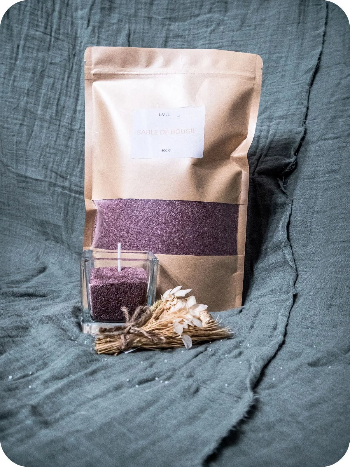 Sable de bougie violet